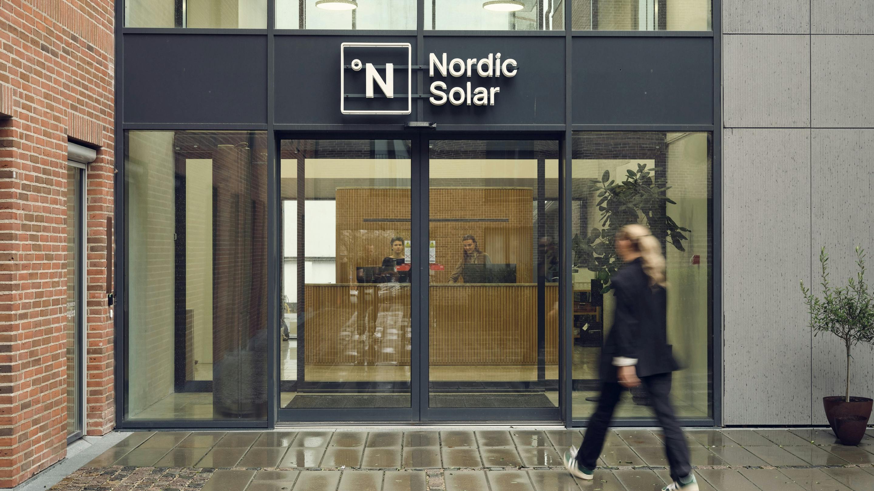 walking through entrance at nordic solar